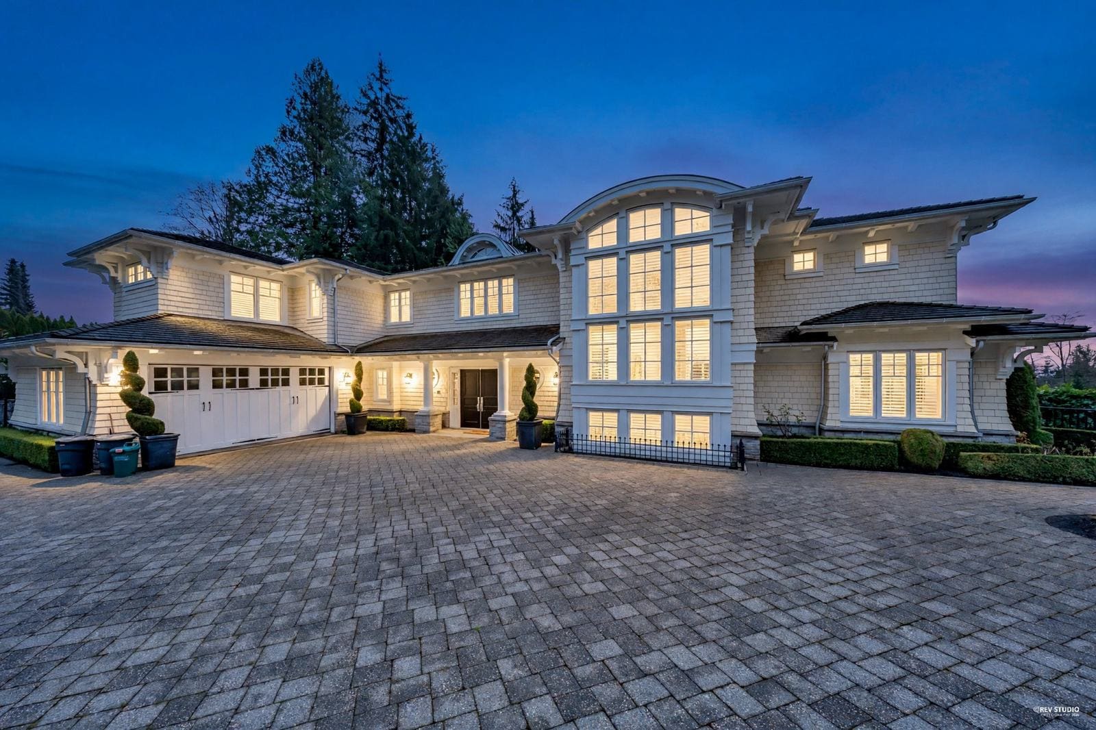 Twilight exterior photo of a Vancouver luxury home by REV Studio